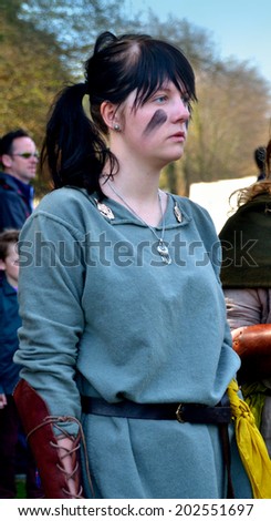 CLONTARF, IRELAND  APRIL 19: An unidentified Danish Viking woman combat re-enactor attending the 1,000th anniversary re-enactment of the Battle of Clontarf on April 19, 2014 in Clontarf, Ireland.