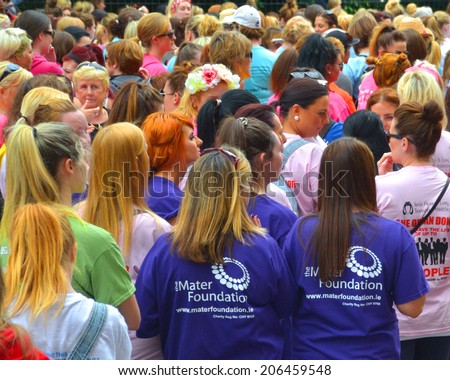 DUBLIN, IRELAND - JUNE 2: Charity participants at the start of The Flora Dublin Women\'s Mini-Marathon at Merrion Square on June 2, 2014 in Dublin, Ireland. Over 40,000 people attended the event.