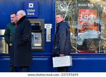 DALKEY, IRELAND - DECEMBER 12: Garda detectives at the scene of an attempted bank robbery on December 12, 2014 in Dalkey, Ireland.