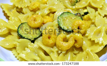 durum wheat pasta topped with shrimp sauce eggs and zucchini