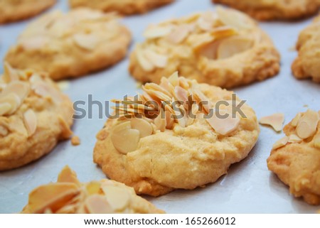 Big almond cookies on tray, Thailand.