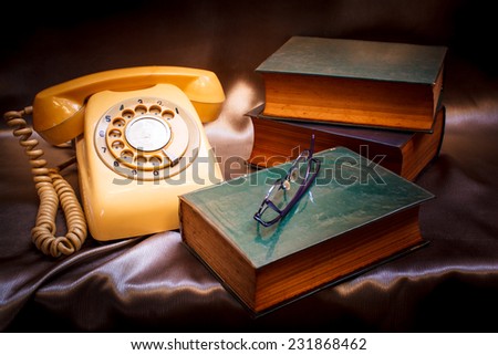 retro phone and book in vintage style.