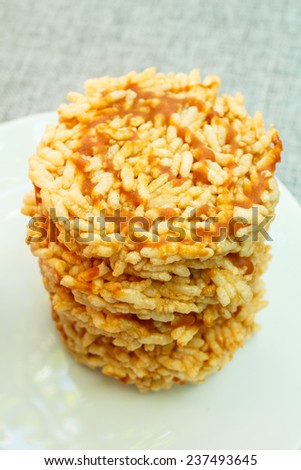 puffed rice with sugar or sweetmeat made of steamed sticky rice, thai snack.