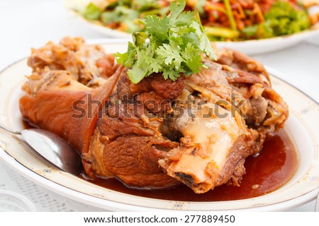 stewed pork leg in brown sauce, style thai food.