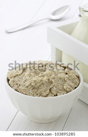 Delicious and nutritious lightly toasted breakfast cereal rice flakes and milk bottle