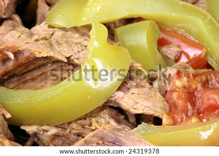 perfectly made mexican machaca beef  delicious aromatic slow down cooked  with hot  and sweet peppers