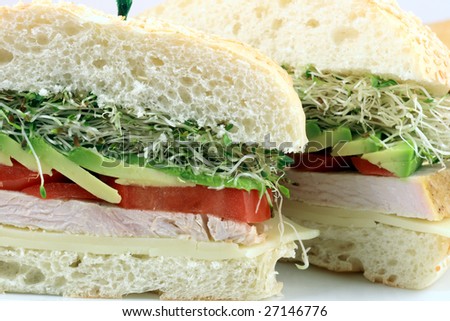 turkey sandwich made with oven roasted turkey breast and organic vegetables