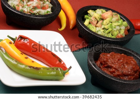 hot grilled peppers with hot pico de gallo and red peppers sauce, perfect mexican food company