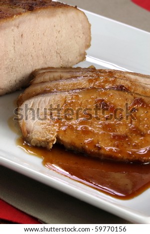 fine pork tenderloin slow roasted  with fresh green apple wedges and apple sauce