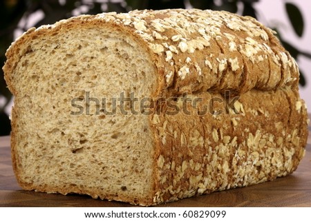 fresh baked  whole grain bread with oats pine nuts and lots of assorted healthy grains
