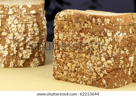 fresh baked  whole grain bread with oats pine nuts and lots of assorted healthy grains