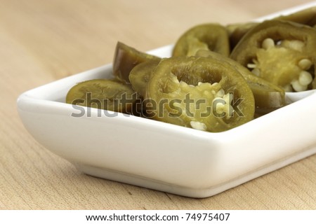 delicious sliced pickled jalapeÃ±os that will leave a hot spicy and  burnig sensation