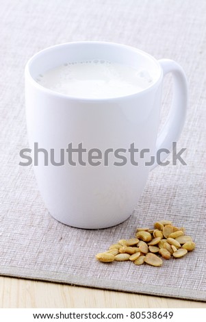 fresh and healthy cup of soy milk made with organic soybeans