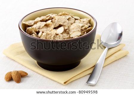 healthy almonds and riceflakes cereal with milk, part of a healthy nutrition program