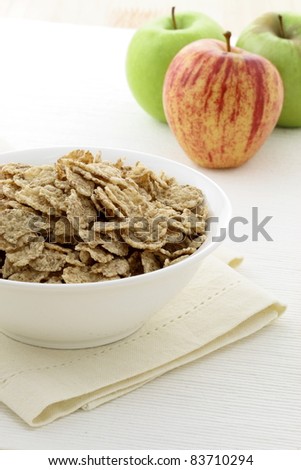 delicious and healthy granola or muesli with fresh organic apples and pears , with lots of dry fruits, nuts and grains.