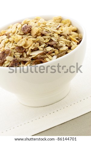 delicious and healthy chocolate cornflakes and almonds muesli or granola great nutritious food.