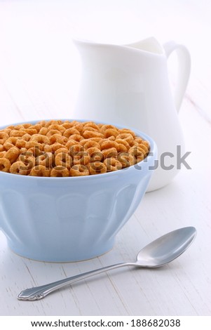 Delicious and nutritious lightly toasted breakfast honey nuts cereal loops on vintage styling