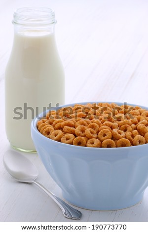 Delicious and nutritious lightly toasted breakfast honey nuts cereal loops on vintage styling