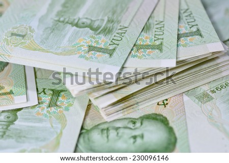 Chinese money (renminbi) - 1 Yuan bank notes for money and business concept ; selective focus with blur background