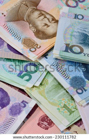 Chinese money (renminbi) - variety Yuan bank notes for money and business concept ; selective focus with blur background
