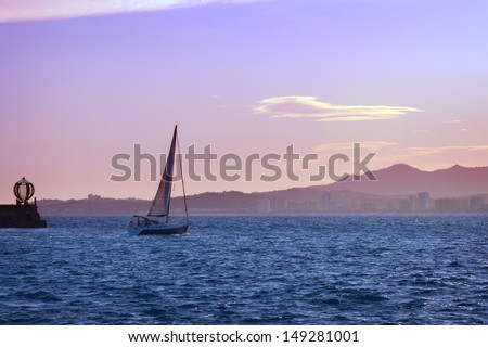 The Evening in Spanish bay, sailboat leaves on sundown.
