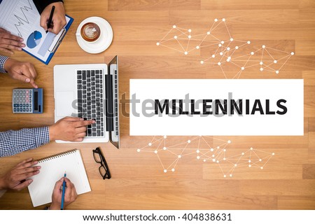 MILLENNIALS CONCEPT Business team hands at work with financial reports and a laptop