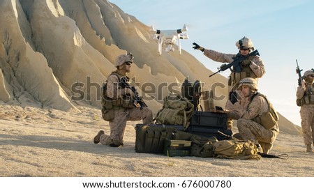 Soldiers are Using Drone for Scouting During Military Operation in the Desert.