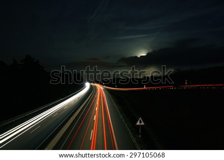 Highway at Night Under the Moon
