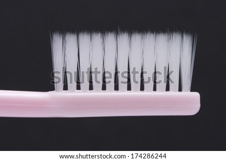 close up Tooth brush isolated on black background