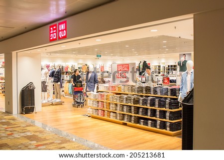 SINGAPORE - JUNE 20: Uniqlo store in Changi Airport, Singapore on June 20, 2014. UNIQLO is a Japanese casual wear designer, manufacture and retailer operating worldwide.