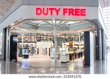 BEIJING - AUGUST 30:  Duty free shop at Beijing Capital Airport on August 30, 2014. The world\'s largest airport terminal-building complex measures 986,000 m2 floor surface.
