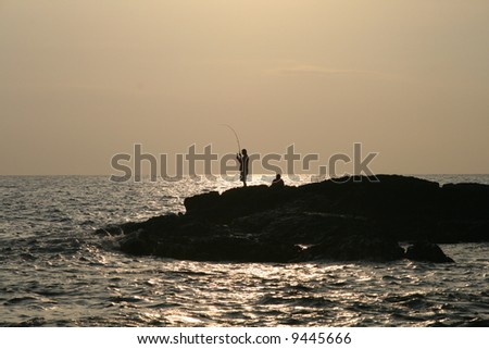 fisherman sunset silhouette