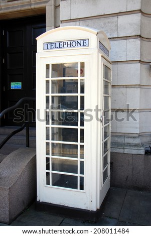 City of Hull telephone kiosk, Hull, East Yorkshire, UK. Hull has a separate telecommunications system from the rest of the UK and has always had cream-coloured phone boxes