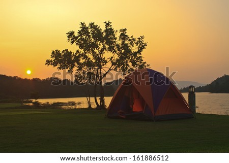 camping ground and sunset at lake Camping at kaeng krachan Dam, Phetchaburi, Thailand