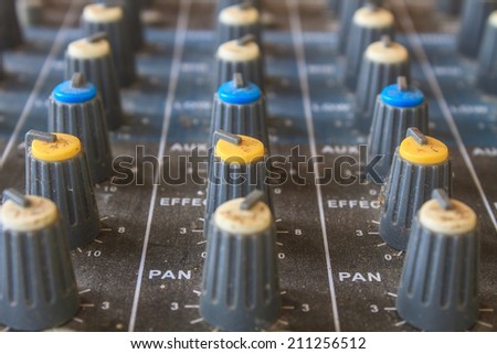 old buttons equipment in audio recording studio