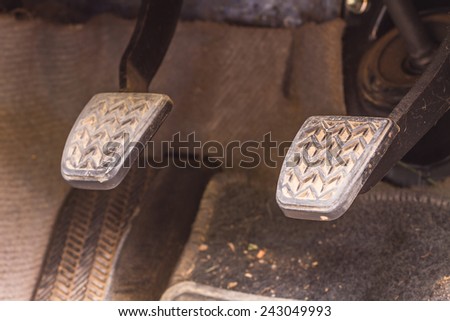 Brake pedal and accelerator in a car