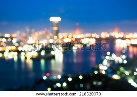 Cityscape river view in twilight time, Blurred Photo bokeh