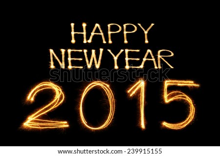 Happy New Year 2015 sparkle firework writing on black background