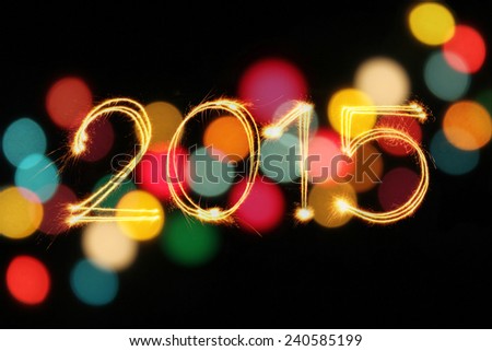 New Year 2015 writing sparkle firework figures