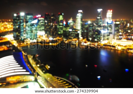 Singapore city Skyline at Night on Sand Sky Park. Blurred Photo bokeh