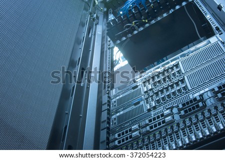 Server and array disk storage in data center with depth of field in cool tone