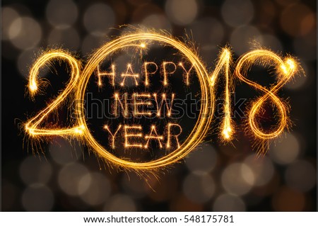 Happy new year 2018 text written with Sparkle fireworks isolated on black background