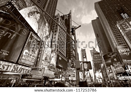 NEW YORK CITY MARCH 25 Times Square featured with Broadway Theaters and animated LED signs is a symbol of New York City and the United States March 25 2012 in Manhattan New York City USA NEW YORK CITY MARCH 25 Times Square featured with Broadway Theaters and animated LED signs is a symbol of New York City and the United States March 25 2012 in Manhattan New York City USA