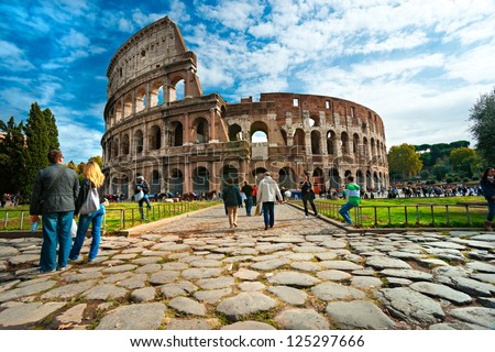 Rome -October 21: Coliseum Exterior On October 21, 2011 In Rome, Italy. The Coliseum Is One Of Rome\'S Most Popular Tourist Attractions With Over 5 Million Visitors Per Year.