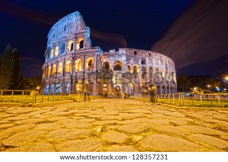ROME -OCTOBER 21: Coliseum exterior on October 21, 2011 in Rome, Italy. The Coliseum is one of Rome\'s most popular tourist attractions with over 5 million visitors per year.