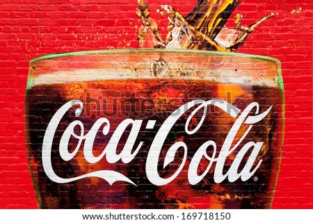 ATLANTA GA USA DECEMBER 04 A glass full of Coca Cola painted in a old wall in Atlanta Georgia on dec 04 2013 Atlanta is the home of Coca Cola ATLANTA GA USA DECEMBER 04 A glass full of Coca Cola painted in a old wall in Atlanta Georgia on dec 04 2013 Atlanta is the home of Coca Cola