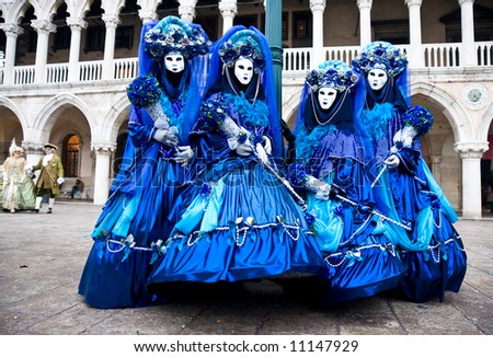 Four Blue mask in Venice, Italy.