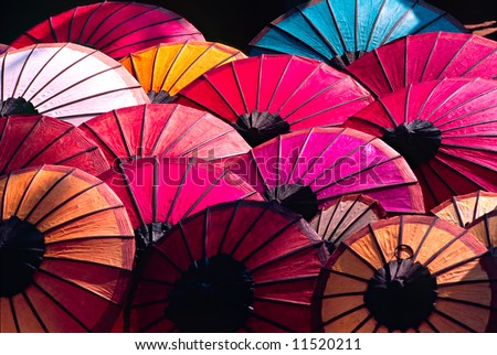 stock photo : Umbrella at a tipical market, Luang Prabang,  Laos.