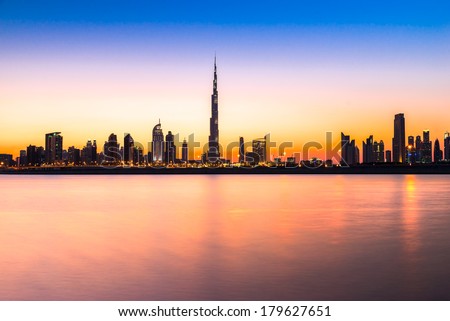 DUBAI, UAE - FEB 08: Skyline view of Dubai showing the Burj Khalifa and skyscrapers of Sheikh Zayed Road on Feb 08, 2014 in Dubai, UAE. The Burj Khalifa, the tallest skyscraper in the world at 829.8m