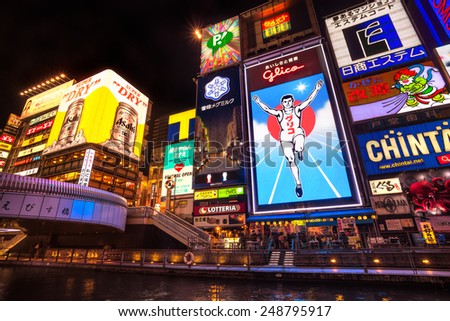 OSAKA, JAPAN - NOVEMBER 24: The Glico Man light billboard and other light displays on November 24, 2014 in Dontonbori, Namba area, Osaka, Japan. Namba is well known as an entertainment area in Osaka.